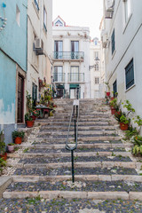 Fototapeta na wymiar Stairs in Alfama neighborhood of Lisbon, Portugal