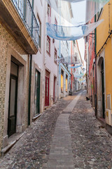 Fototapeta premium Narrow alley in the center of Coimbra, Portugal
