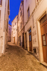 Fototapeta na wymiar Narrow cobbled street in Coimbra, Portugal