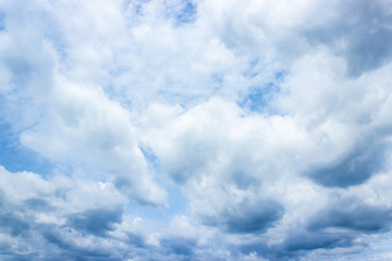 Blue sky and white clouds in day time.