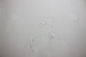 White cracked wall with water seeps. old conception background