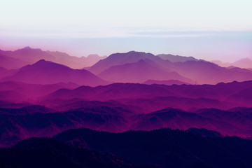Purple dream background of distant mountains. Mountain background - obrazy, fototapety, plakaty