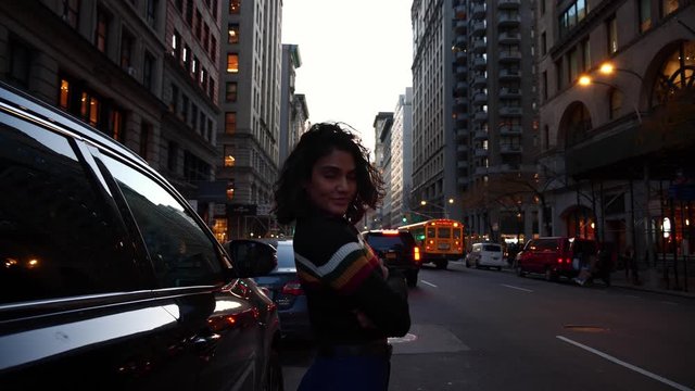 Beautiful multi-ethnic hispanic millennial female on New York city street. Concept of urban modern lifestyle, fashion in NYC, mixed race American.