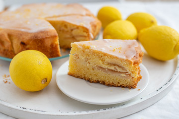 Lemon pound cake on rustic wooden background 