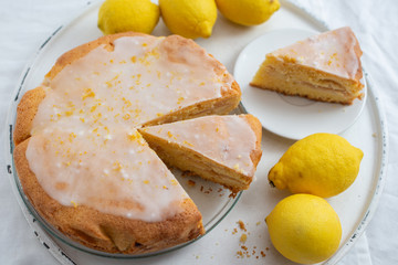 Lemon pound cake on rustic wooden background 