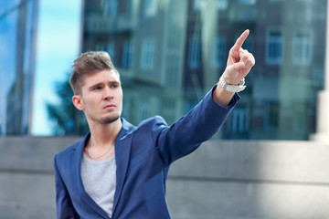 Businessman pressing an imaginary button