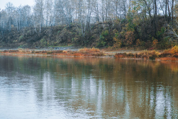 Obraz na płótnie Canvas Beautiful river in rainy morning. Autumn landscape.
