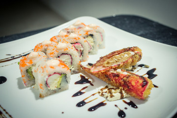 Delicious japanese traditional sushi roll made with rice, eel sauce, crab and shrimp