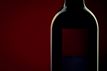 Red Wine bottle silhouette on red black background