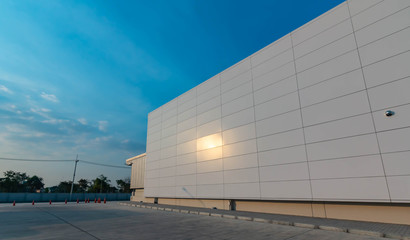 Fototapeta na wymiar Warehouse building with blue sky