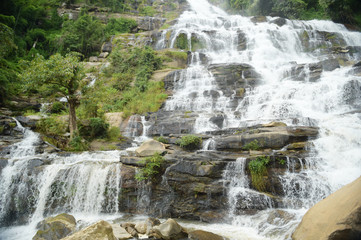 Beautiful waterfall with stones in forest, Thailand