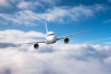 Naklejka na ściany i meble Passenger airplane climb altitude and low flying overcast.
