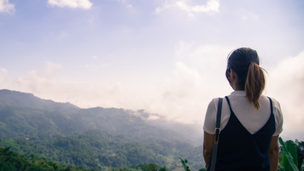 woman on top of mountain