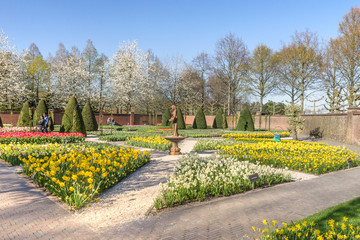 Keukenhof, Lisse, Netherlands - 10 April 2019: Artificial pond in the park on a sunny day. Spring flowers in Koekenhof