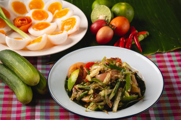 [Thai Esan food] Papaya Salad with boiled egg, Thai Esan local food, Thailand