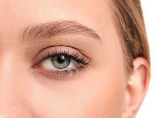 Young woman with beautiful eyebrows, closeup