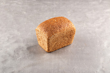 Freshly Baked Homemade Bread, close-up on a stone table