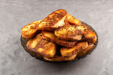 French toast for breakfast sweet dessert selective soft focus. Soft croutons fried in an egg