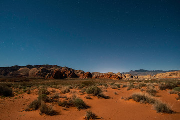 Fototapeta na wymiar USA, Nevada, Clark County, Gold Butte National Monument. A view of the night sky with stars over Bitter Ridge with Virgin Peak in the Distance.