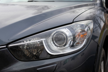 Obraz na płótnie Canvas Modern car headlight