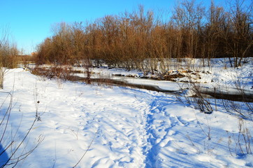 Winter landscape with the river and in frosty day