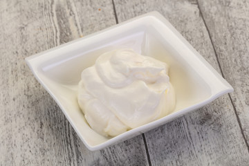 Sour cream in the bowl