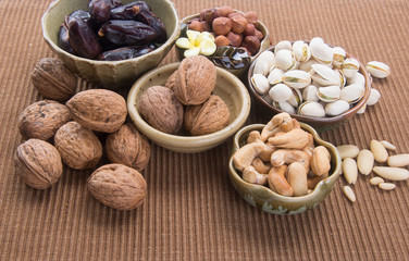 nuts or hazelnuts nuts and mix nut on a background new.