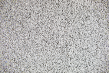 Gray plaster, building insulation on foamed polystyrene, background, texture.