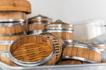 Stack of bamboo steamers in a kitchen in China