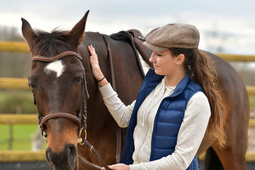 Obraz premium Portrait of horsewoman and horse