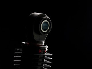 black shock absorber on black background