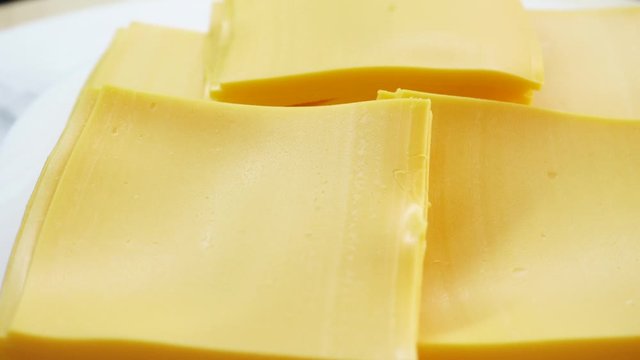 cheddar cheese on rotating plate