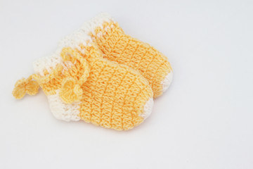 Handmade of newborn baby shoes isolated on white background