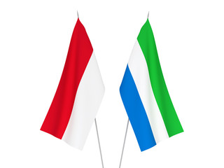 National fabric flags of Sierra Leone and Indonesia isolated on white background. 3d rendering illustration.