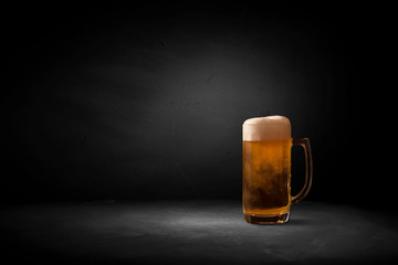 mug of beer on dark background beer, glass, foam,