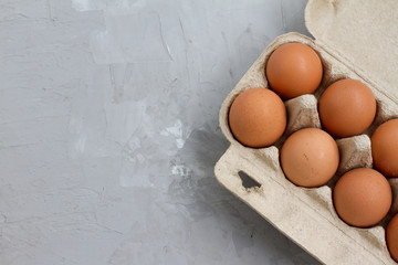 Easter. palm Sunday. chicken eggs in a box. eggs in a package. space for text. the view from the top. healthy snack. protein.