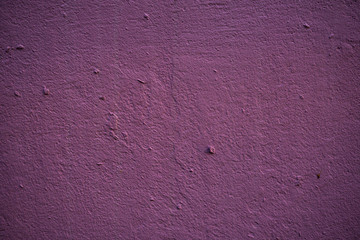 Texture of an old wall covered with paint. Background image of a worn paint coated surface