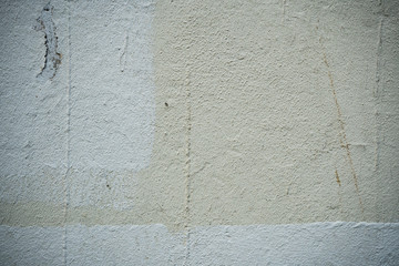 Texture of an old wall covered with paint. Background image of a worn paint coated surface
