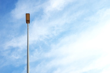 A street light on a blue sky