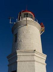 Tokarevsky lighthouse against the blue sky.