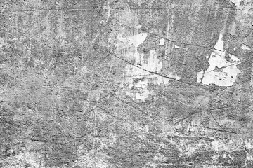 Texture of a concrete wall with cracks and scratches which can be used as a background