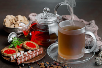 Tea in a cup on an old background