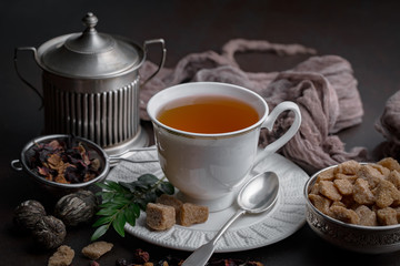 Tea in a cup on an old background