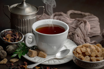 Tea in a cup on an old background