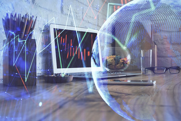 Multi exposure of forex graph and work space with computer. Concept of international online trading.