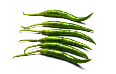 Fresh green chili peppers isolated on white background