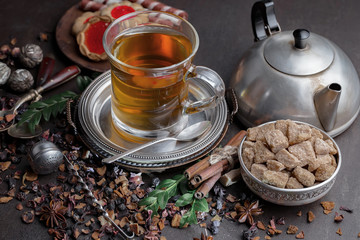 Tea in a cup on an old background