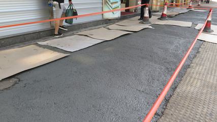 Temporary pavement repairs in Hong Kong Kowloon district