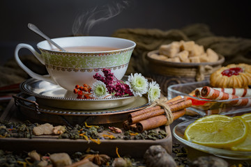 Tea in a cup on an old background