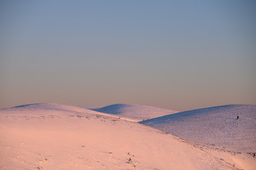 Shape of hills, blue edit space at the top of the image